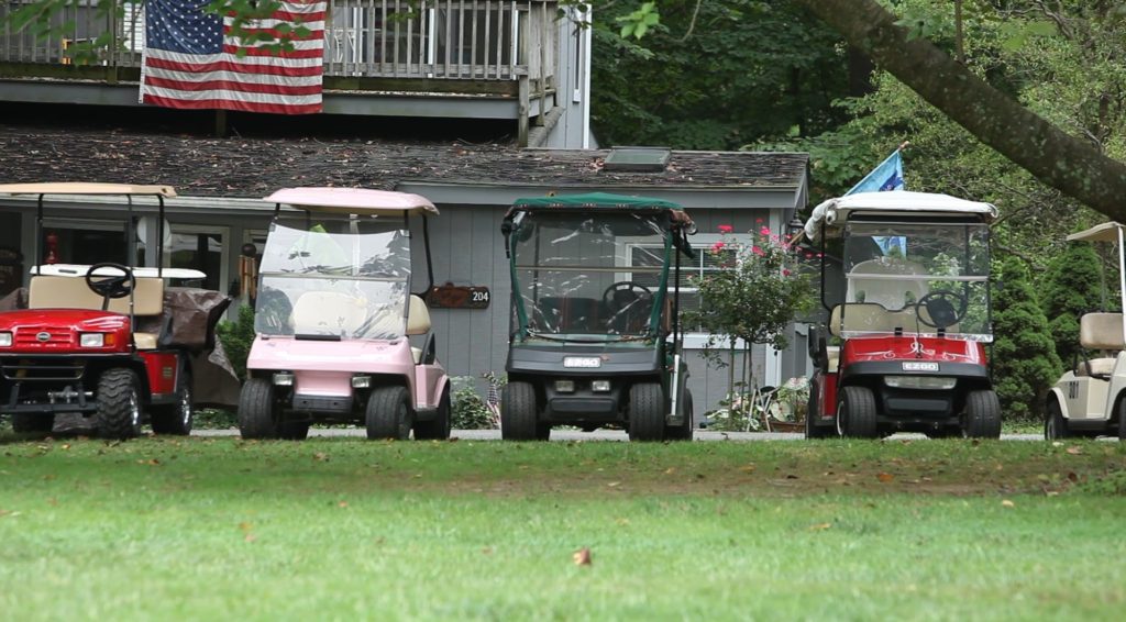 Club overview: Golf carts are a common mode of transportation at the club.