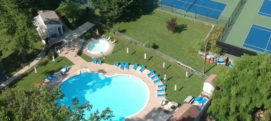 The outdoor pool at Pine Tree Associates Nudist Club.